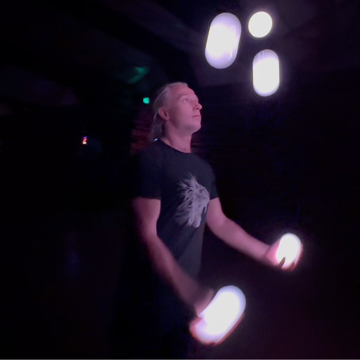 flowtoys flowmoja LED juggling balls in action - modular, full spectrum, & rechargeable juggling balls w/ lifetime warranty