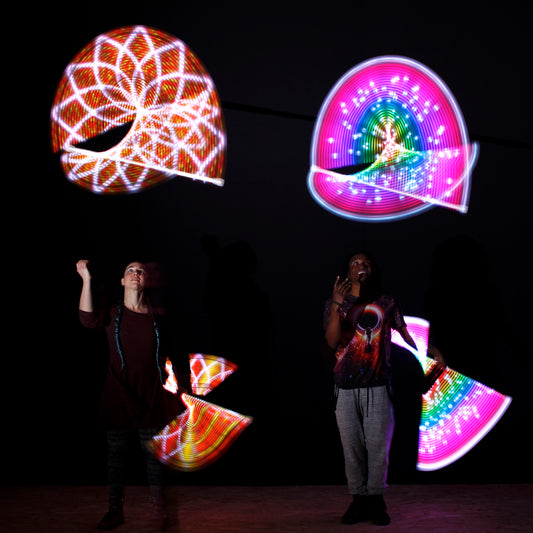 flowtoys full vision LED baton with 22mm diameter shaft in action :: multi-pixel, full spectrum, fully illuminated, rechargeable staff with lifetime warranty