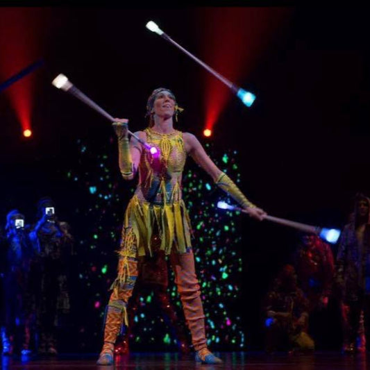 World champion baton twirler Jennifer Marcus with flowtoys lumina twirl LED batons in Cirque du Soleil VOLTA show